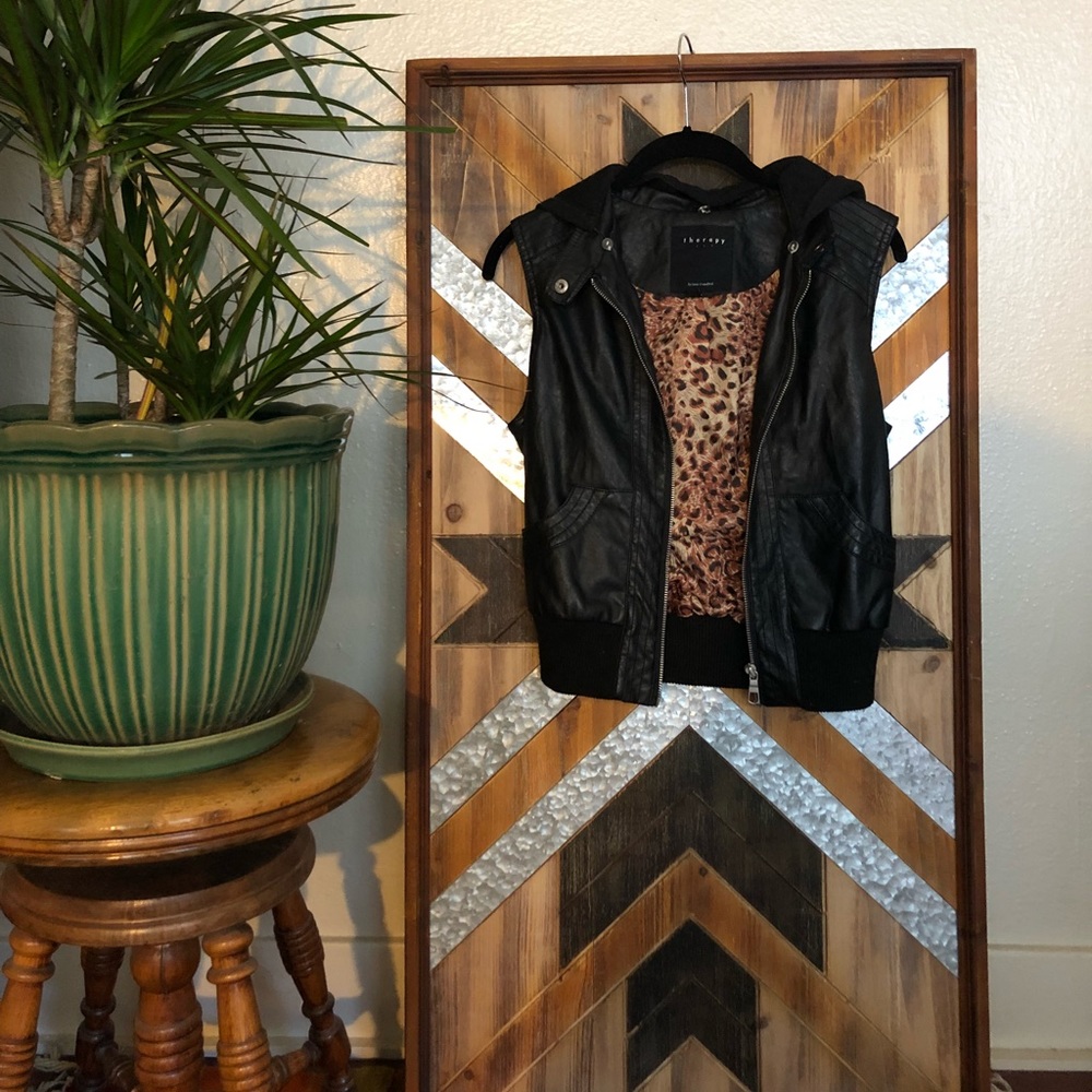 Faux leather vest. Flattering Bomber fit